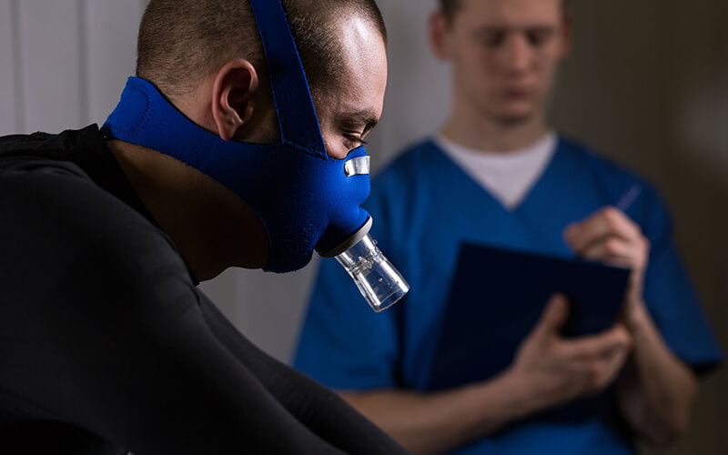 Guy getting his V02 Max Tested After Training with Elevation Mask